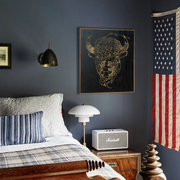Buffalo head portrait carved in wood framed in reclaimed rustic wood.
