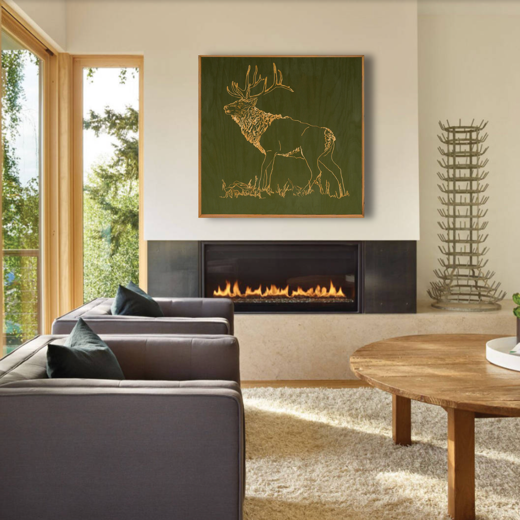 Living room with gray accent chairs, wooden coffee table, and wall art of a carved elk 
