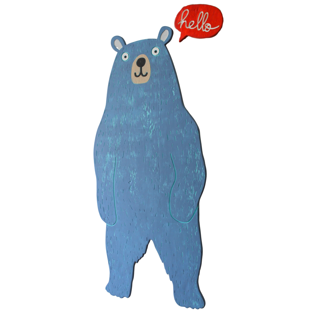 A blue bear-shaped wall sign with a red speech bubble that says 'hello' in white script, shown against a plain white background.