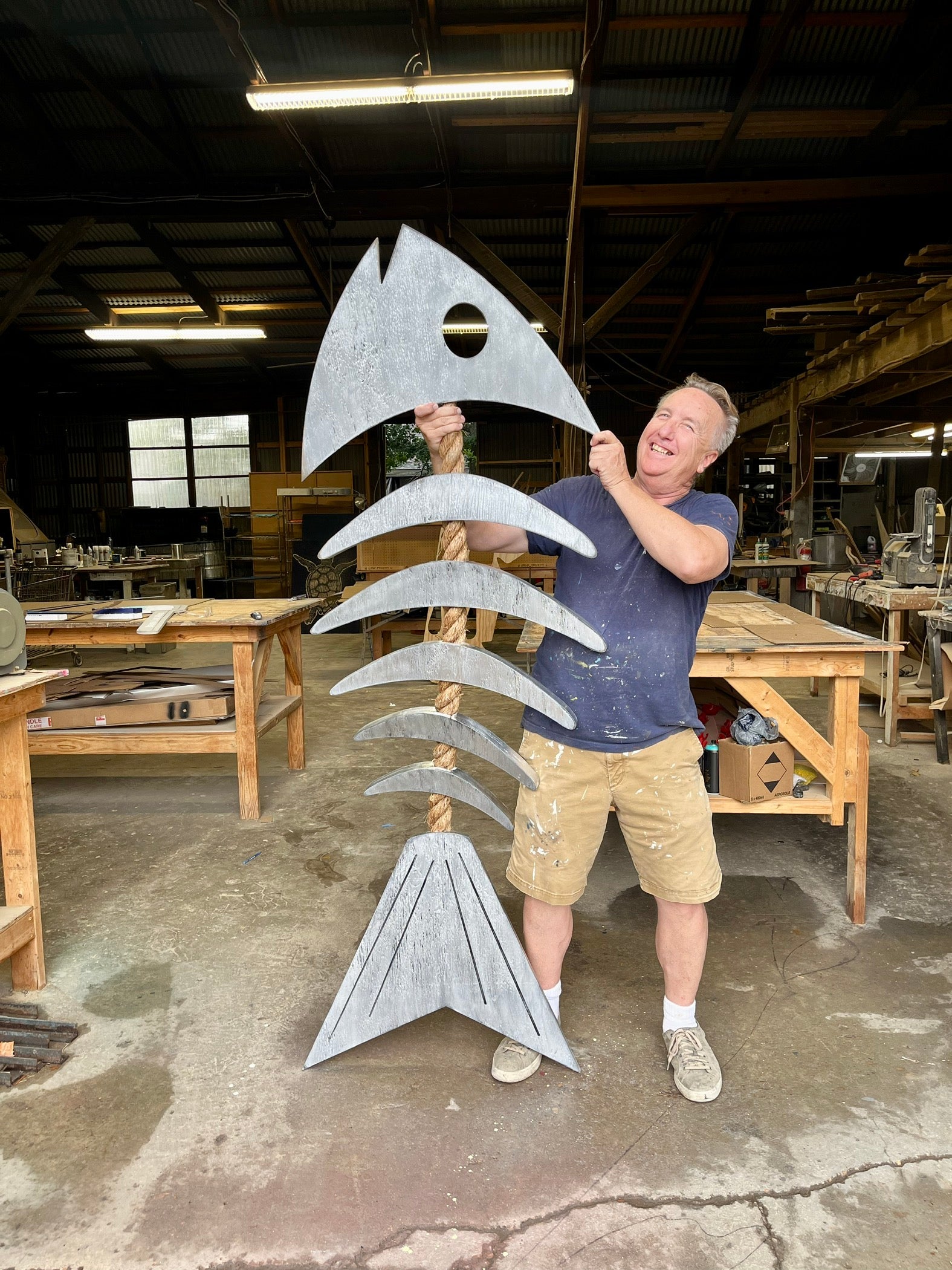 In the New Orleans studio of Haven America 80" Rope fish Distressed Silver paint