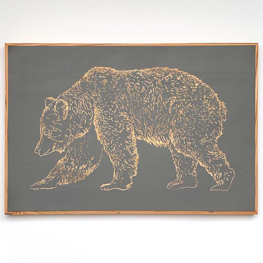 Carved wooden bear framed wall art in natural wood and painted finish