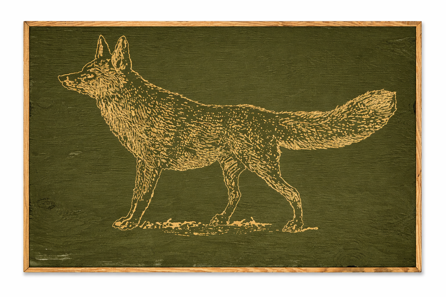 carved fox artwork in earth green