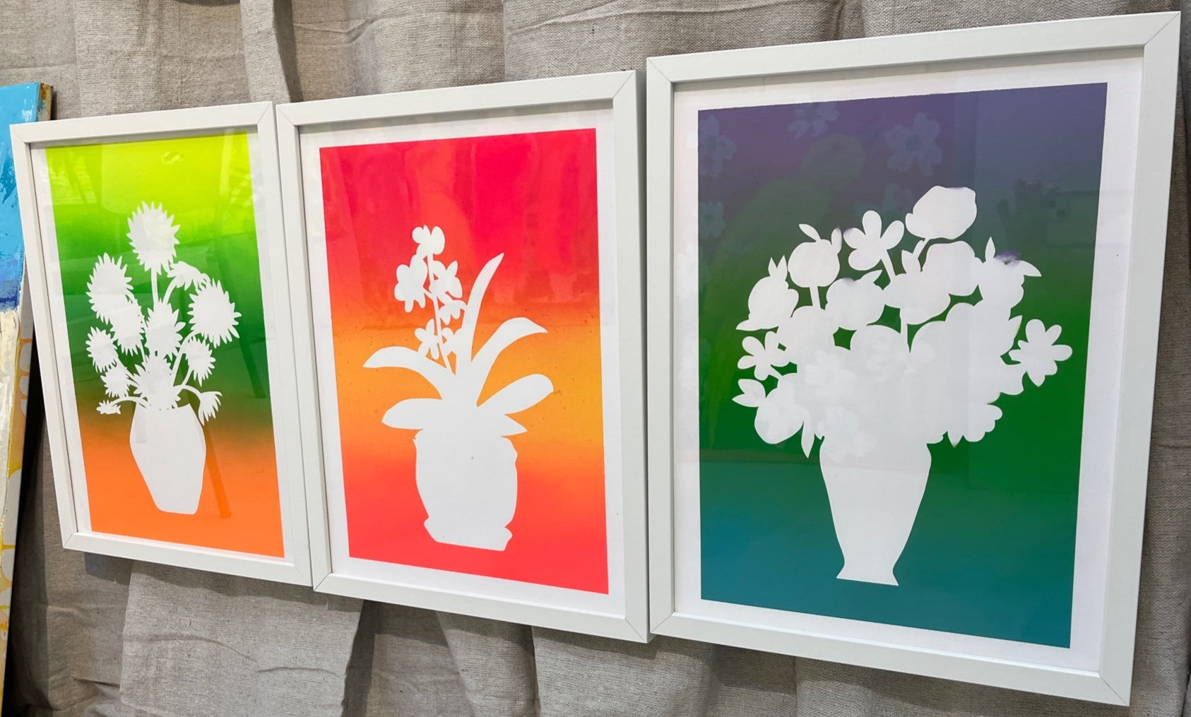grouping of flower vase prints