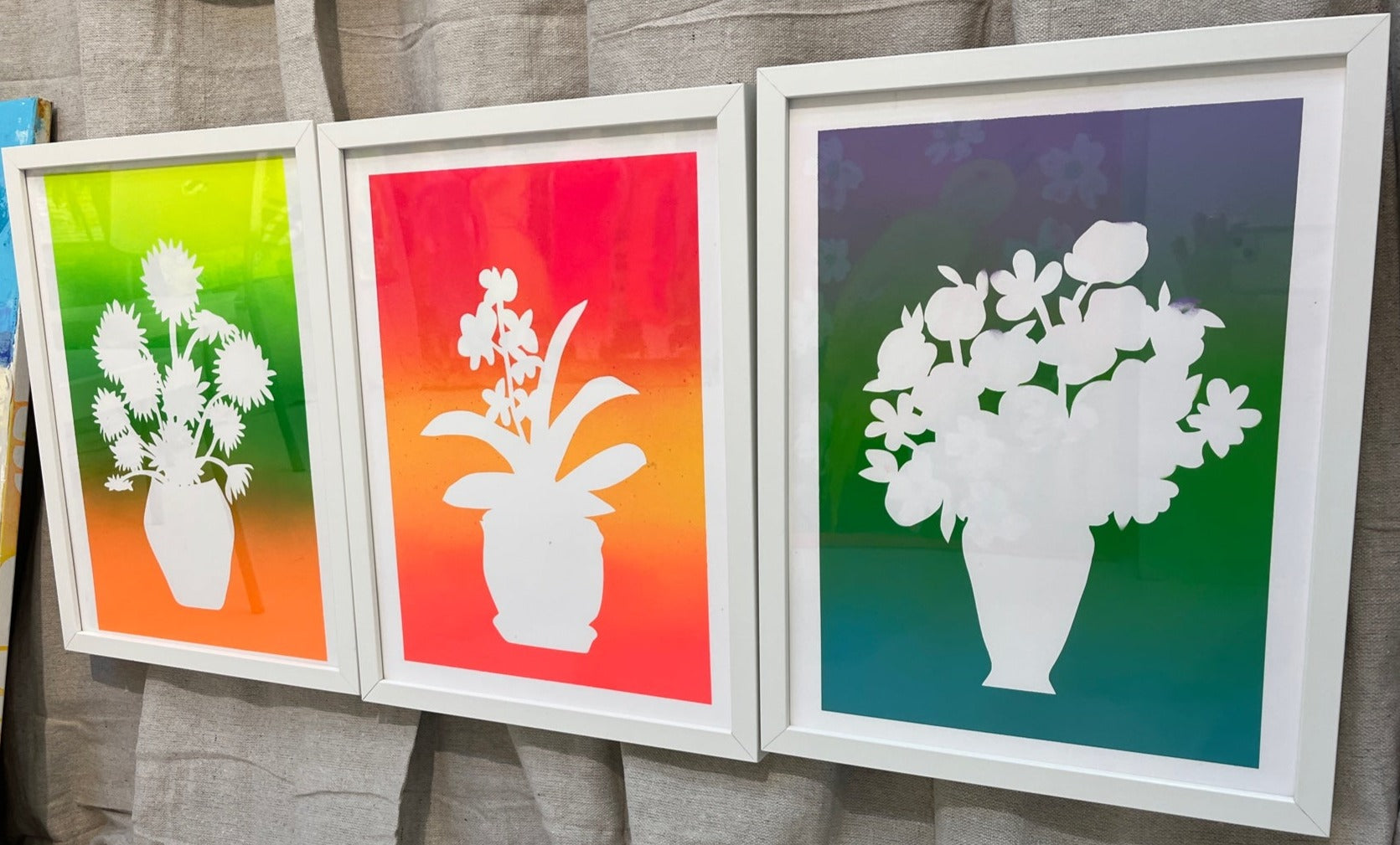 grouping of floral vase prints