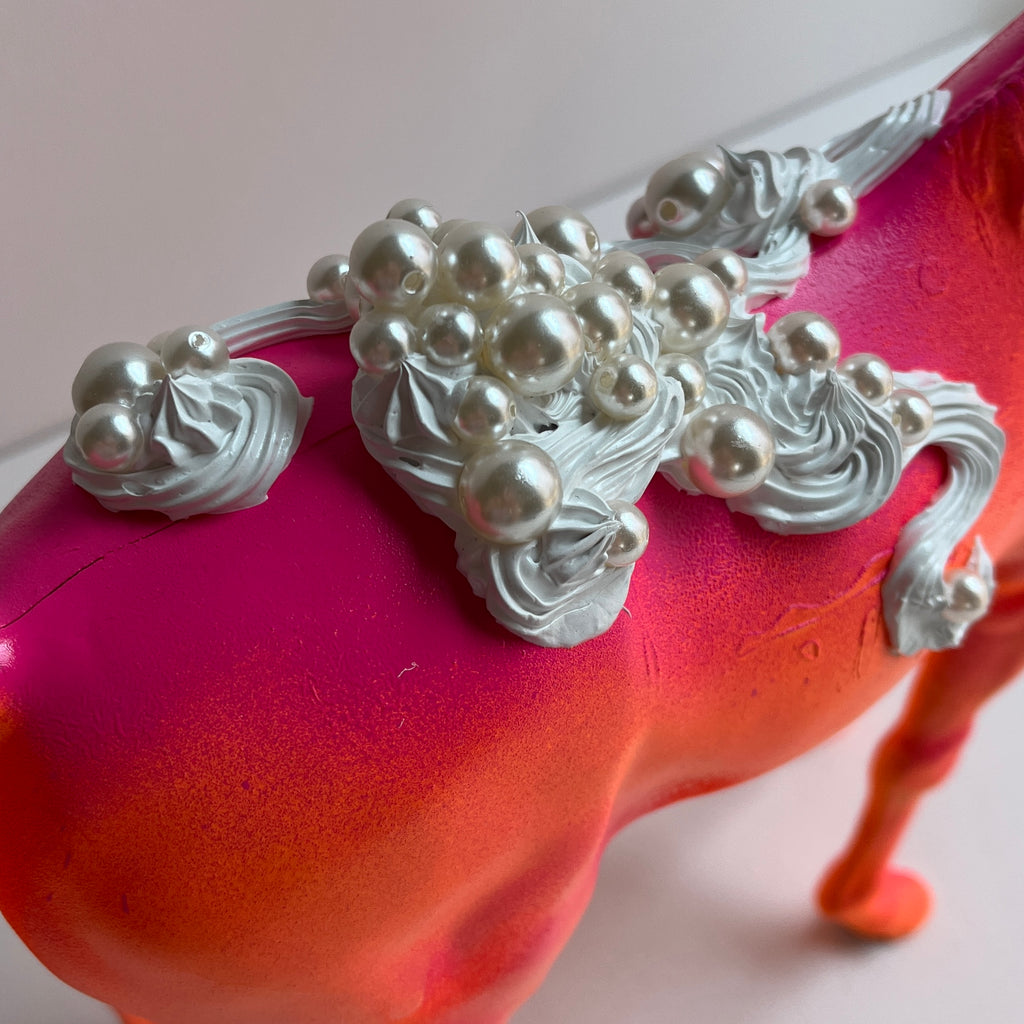 close up of pearl beads in acrylic "icing" paint