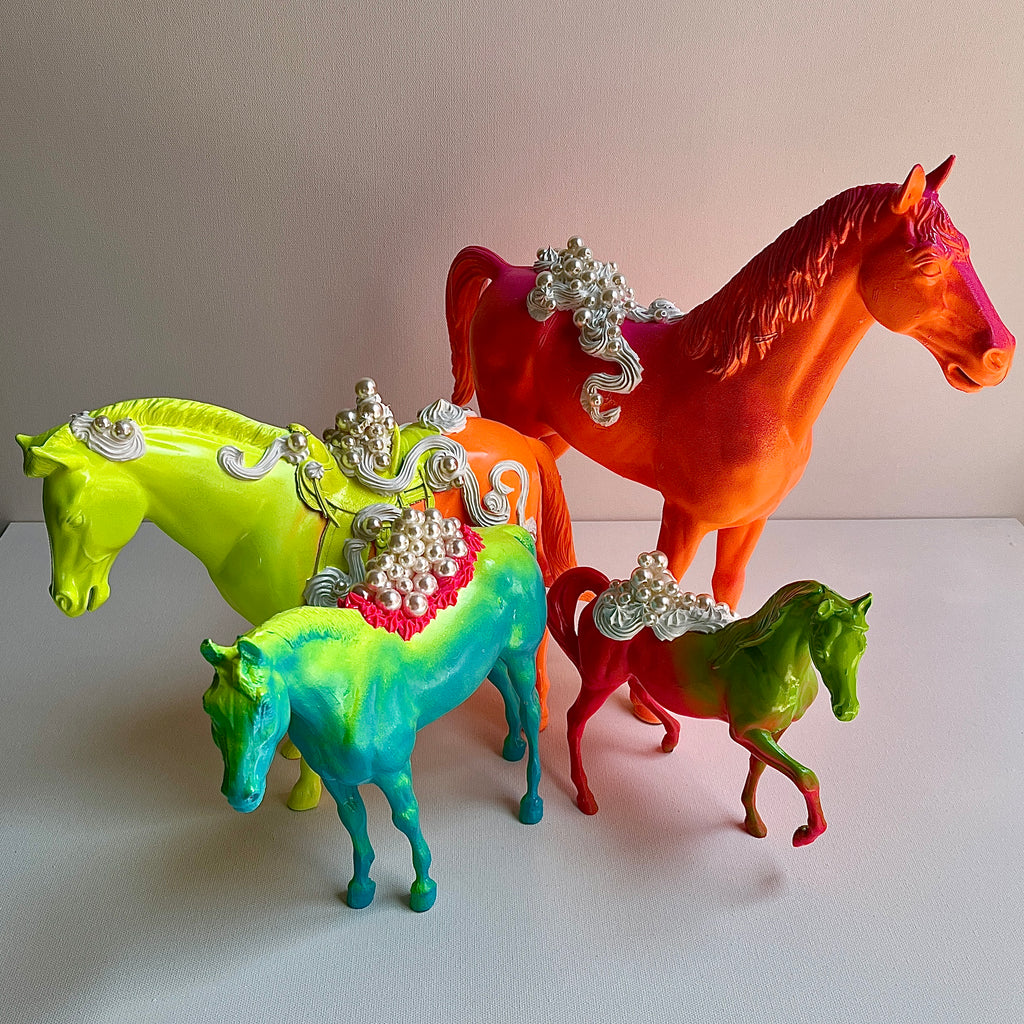 group photo of all the horse sculptures