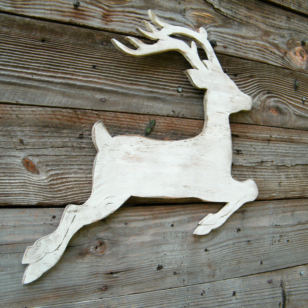 White Flying Reindeer Wall Decor - Haven America. All wooden reindeer, shown in white. Perfect reindeer decor!